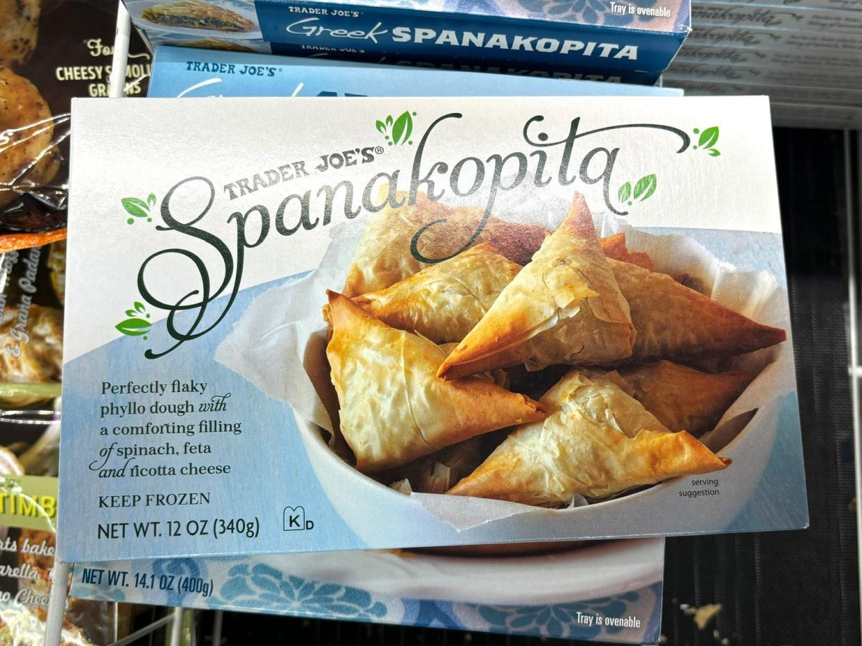 A box of Trader Joe's spanakopita in the freezer section.