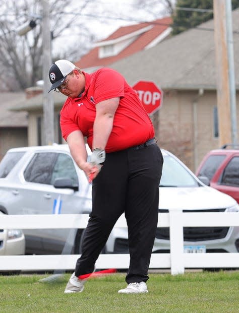 Roland-Story's Dillon Gustafson tees off during a dual meet with Ogden April 25 at the Riverbend Golf Course in Story City.