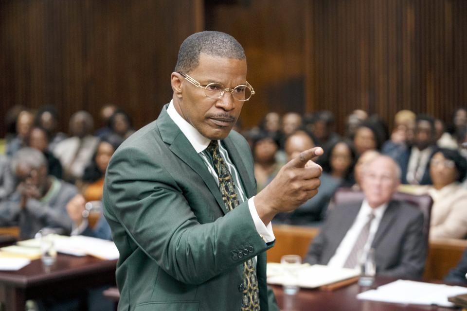 Jamie Foxx portraying a lawyer in a courtroom, gesturing during an argument