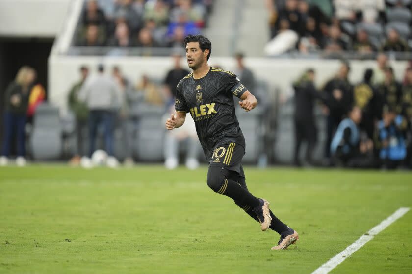 Los Angeles FC forward Carlos Vela runs across the field during the second half of an MLS soccer match against the Portland Timbers Saturday, March 4, 2023, in Los Angeles. (AP Photo/Jae C. Hong)