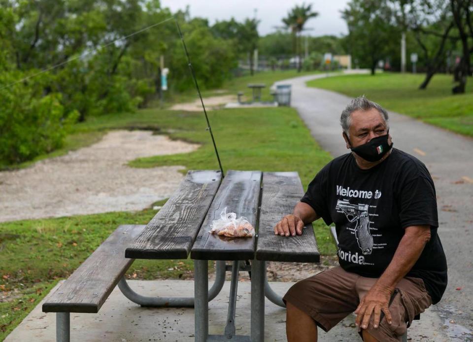 Tropical Depression 19 makes its way across South Florida as Jeronimo Garcia, 62, fishes at Black Point Park and Marina in Homestead on Saturday, September 12, 2020.