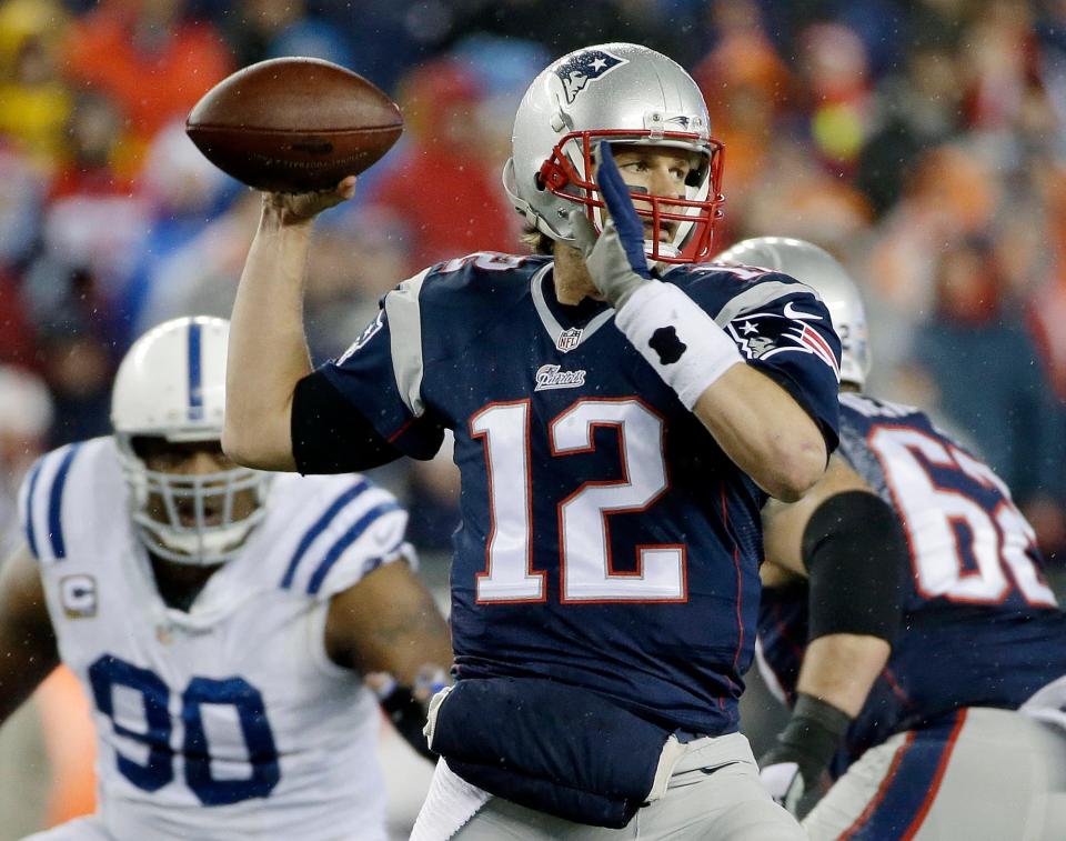 In this Jan. 18, 2015, file photo, New England Patriots quarterback Tom Brady looks to pass during the first half of the NFL football AFC Championship game against the Indianapolis Colts in Foxborough, Mass.