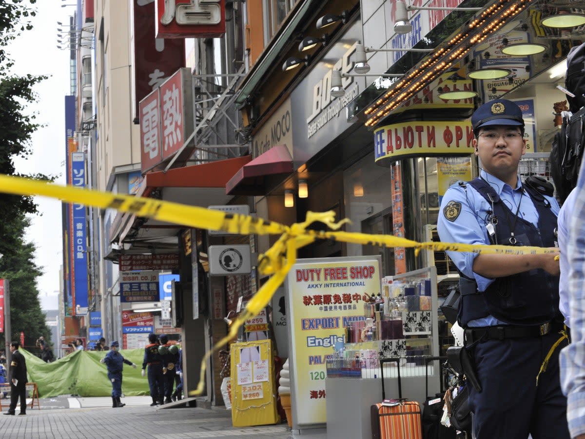 Police at the scene of a mass murder in Tokyo in 2008 which has now seen perpetrator Tomohiro Kato put to death (AFP/Getty)