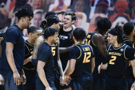 Missouri players react after defeating Tennessee in an NCAA college basketball game Saturday, Jan. 23, 2021, in Knoxville, Tenn. (Calvin Mattheis/Knoxville New-Sentinel via AP, Pool)