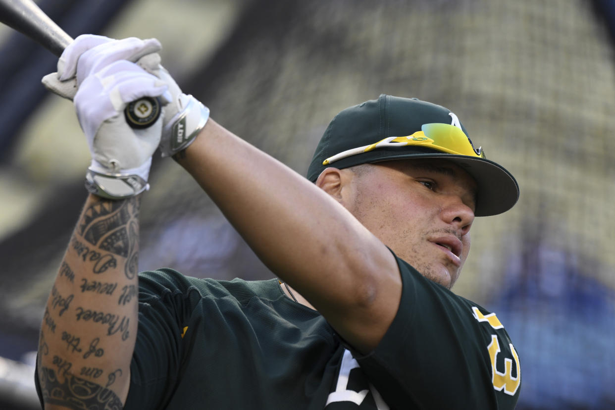 Bruce Maxwell cannot travel to Canada. (AP Photo/Michael Owen Baker)