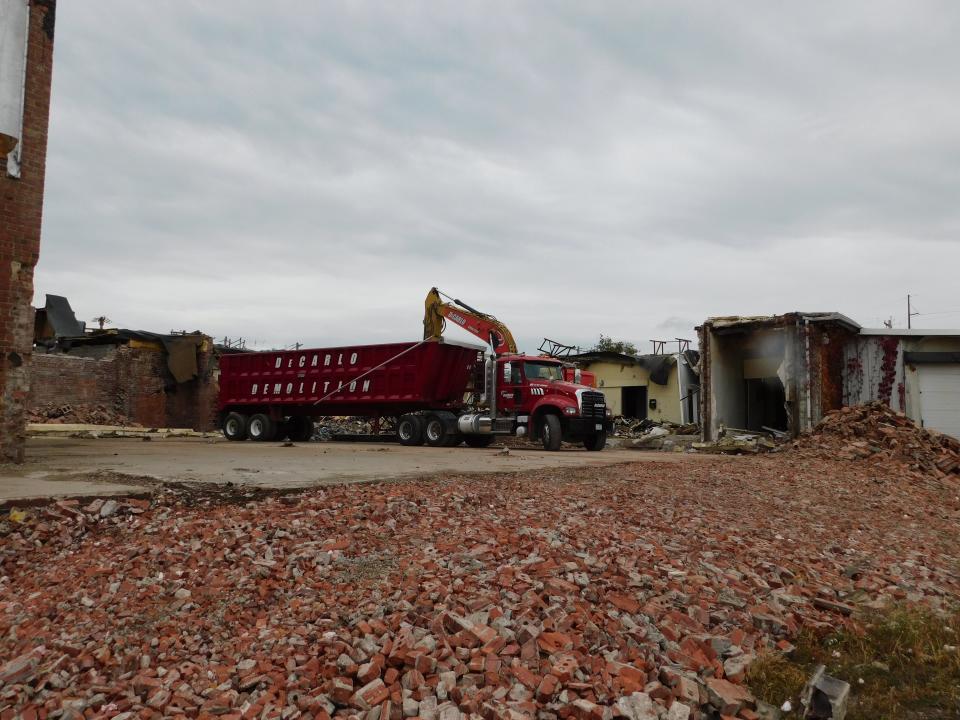 DeCarlo Demolition Company prepares the Des Moines Cold Storage site for redevelopment after the partial demolition in October.