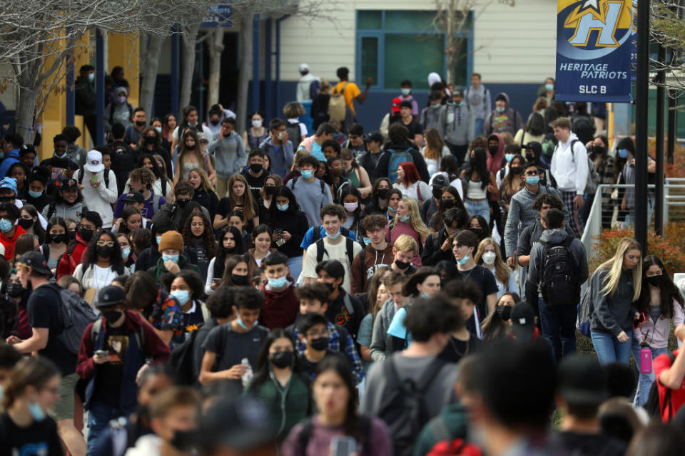 March 1, 2022: Students move across the Heritage High School campus between class periods in Brentwood, Calif. The Liberty Union High School District no longer requires students to wear masks indoors. (Aric Crabb / Getty Images)