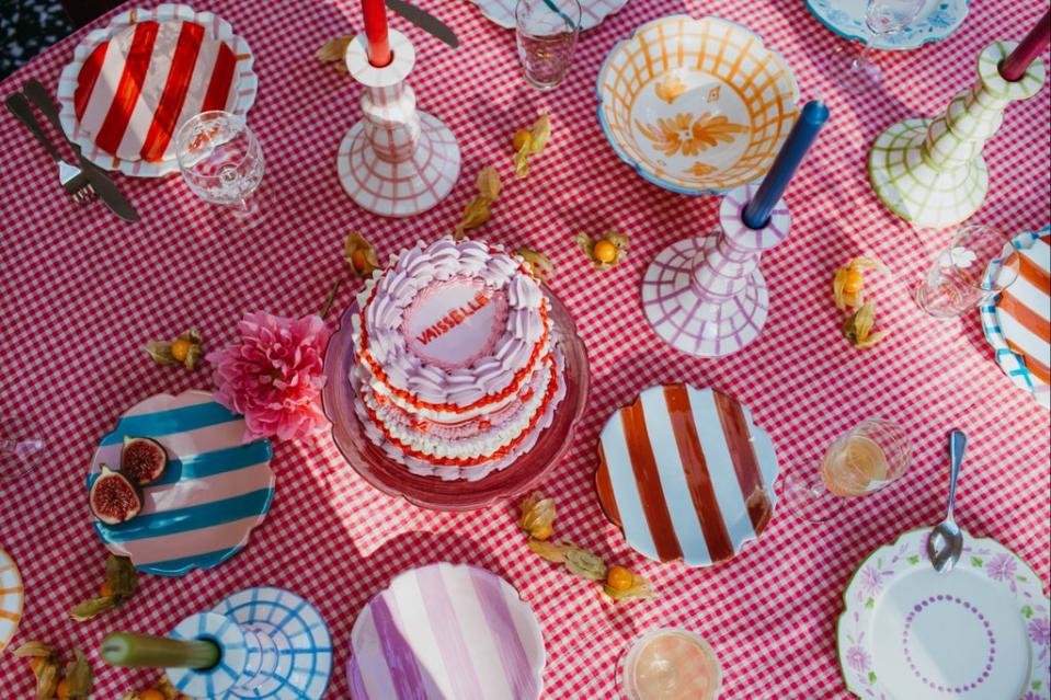 Products include hand painted gingham tea cups and saucer sets in vibrant shades (£55) (Handout)