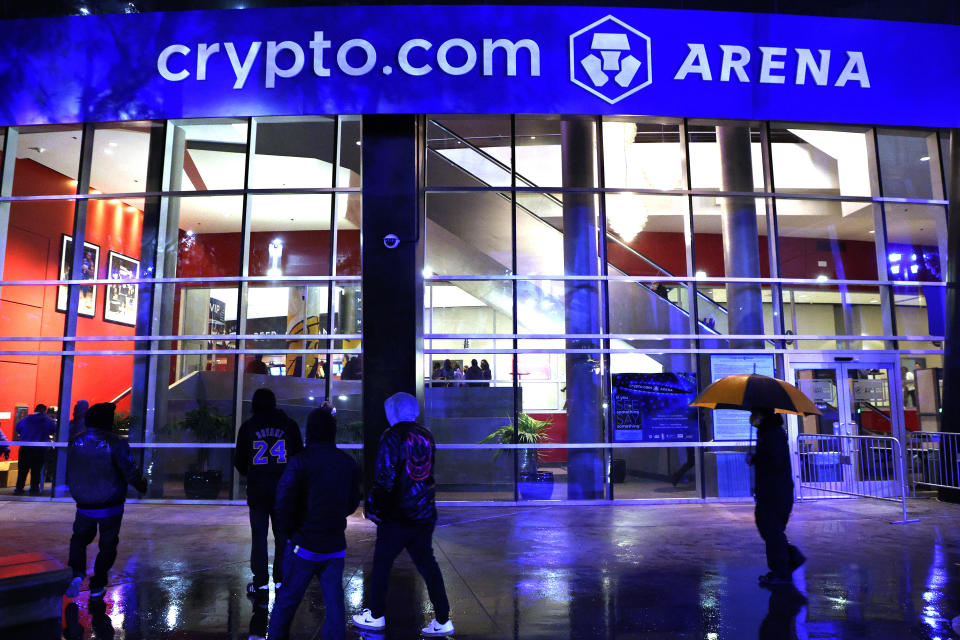 LOS ANGELES, CALIFORNIA - DECEMBER 23: Crypto.com arena signs hang as fans wait to enter before the game between the San Antonio Spurs and the Los Angeles Lakers at Staples Center on December 23, 2021 in Los Angeles, California. (Photo by Harry How/Getty Images)