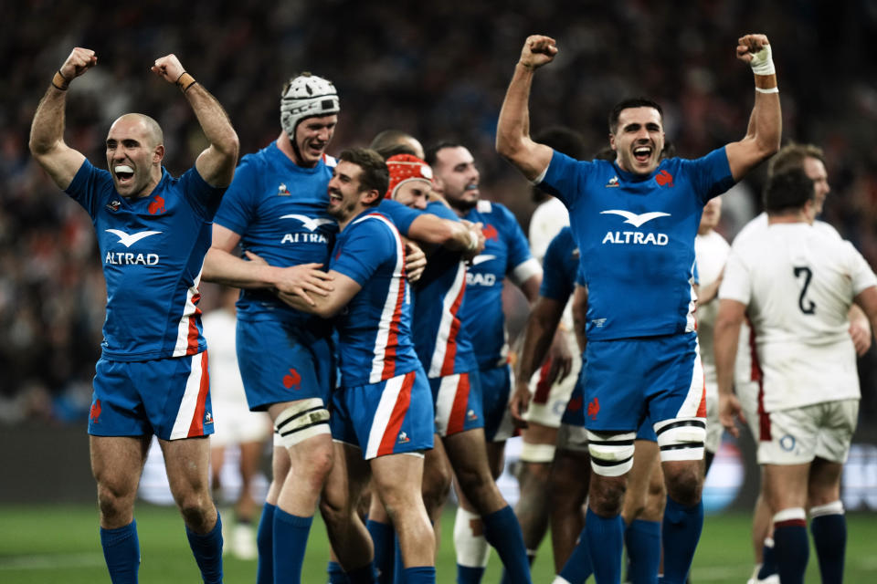 FILE - French players celebrate after defeating England during the Six Nations rugby union international match between France and England at the Stade de France in Saint-Denis, near Paris, Saturday, March 19, 2022. The 2023 Six Nations starts on Feb. 4. (AP Photo/Thibault Camus, File)
