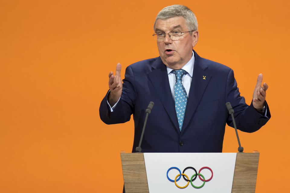 International Olympic Committee (IOC) president Thomas Bach from Germany speaks before the presentation final presentation of the Stockholm-Are candidate cities the first day of the 134th Session of the International Olympic Committee (IOC), at the SwissTech Convention Centre, in Lausanne, Switzerland, Monday, June 24, 2019. The host city of the 2026 Olympic Winter Games will be decided during the134th IOC Session. Stockholm-Are in Sweden and Milan-Cortina in Italy are the two candidate cities for the Olympic Winter Games 2026. (Laurent Gillieron/Keystone via AP)