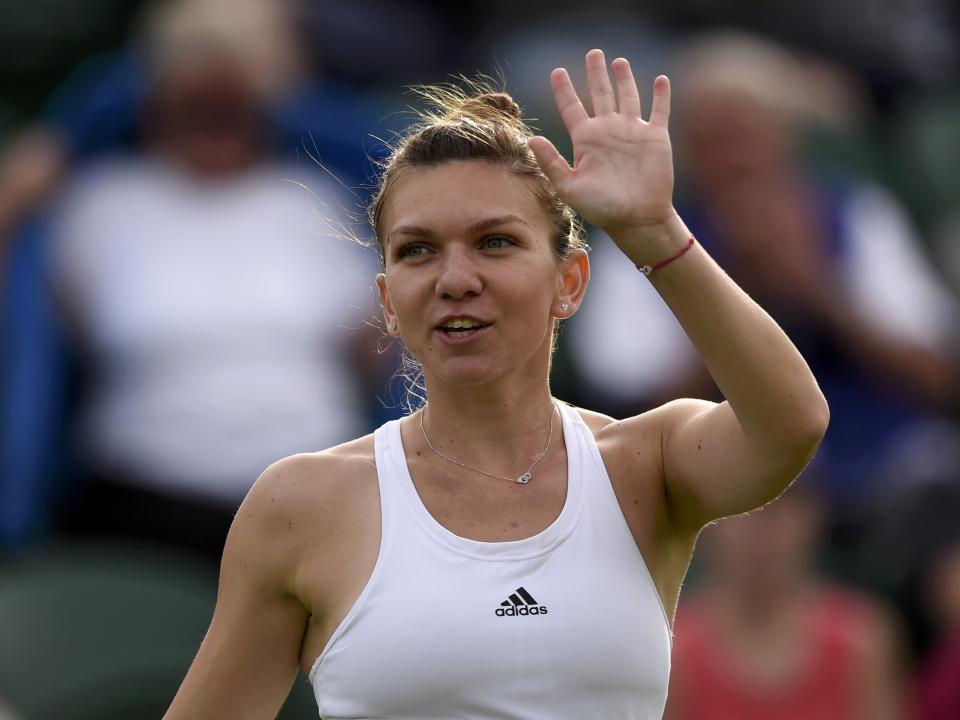 Britain Tennis - Wimbledon - All England Lawn Tennis & Croquet Club, Wimbledon, England - 27/6/16 Romania's Simona Halep celebrates after winning her match against Slovakia's Anna Karolina Schmiedlova REUTERS/Tony O'Brien