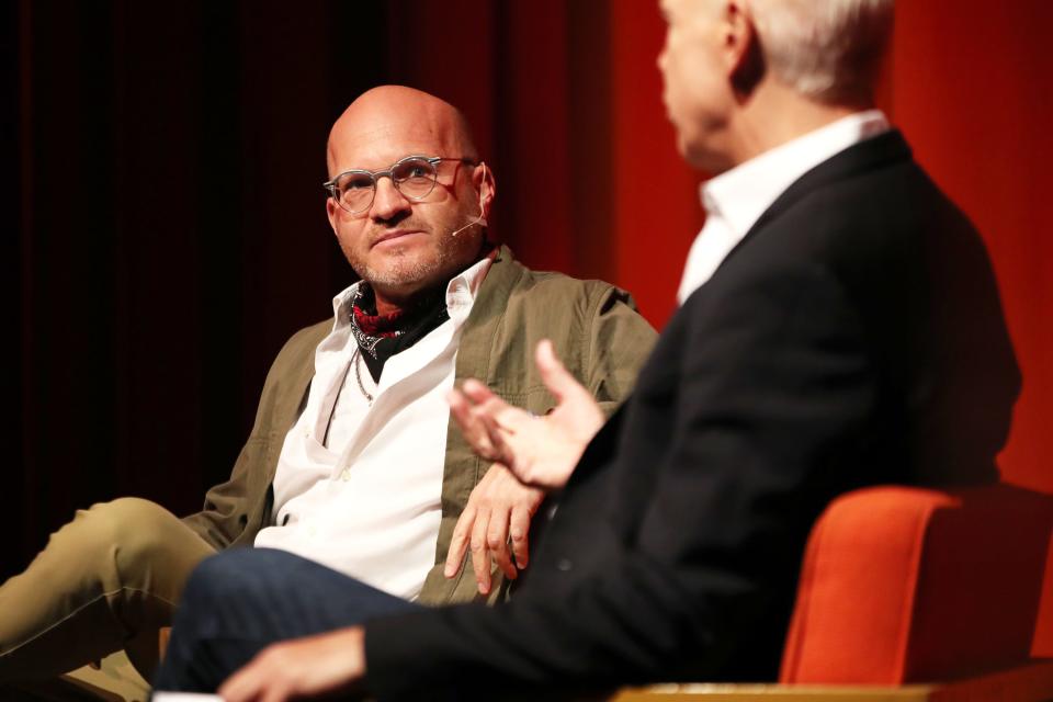 Palm Springs Art Museum Executive Director and CEO Adam Lerner, left, and Annenberg Theater Committee co-chair David Zippel converse about plans for the future of the Palm Springs Art Museum inside the Annenberg Theater in Palm Springs, Calif., on December 6, 2021. 