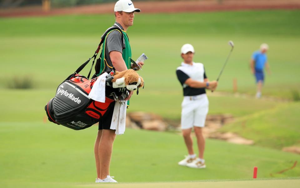 Rory McIlroy (right) is using his friend Niall O'Connor as a temporary caddy this week - Getty Images Europe