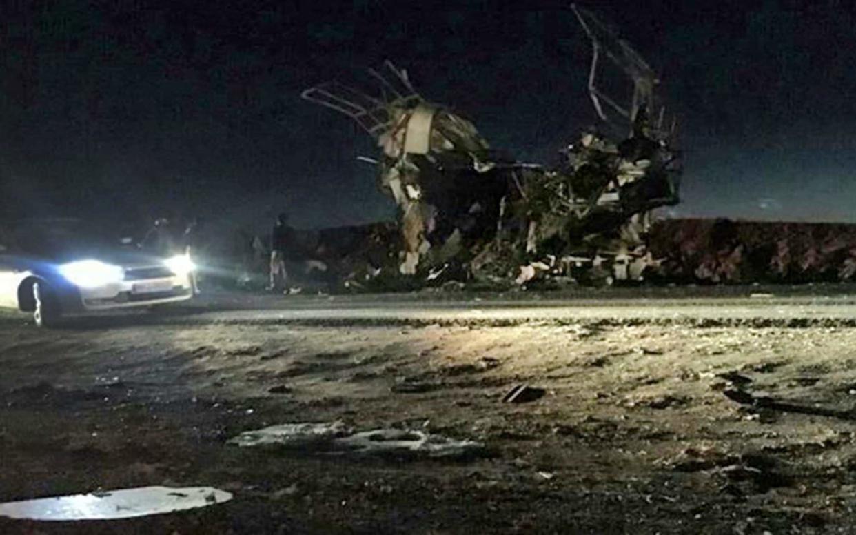  A bus that was reportedly blown up by a suicide attack in southeastern Iran on February 13 2019. - AFP