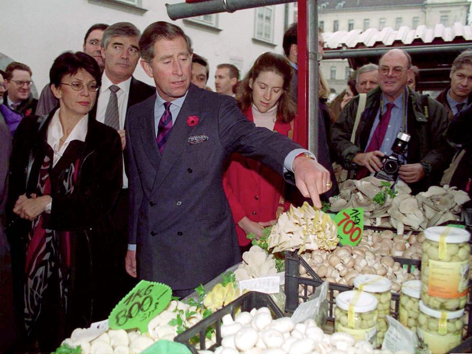King Charles looking at a mushroom stall at a market in Ljubljana, Slovenia, in November 1998.