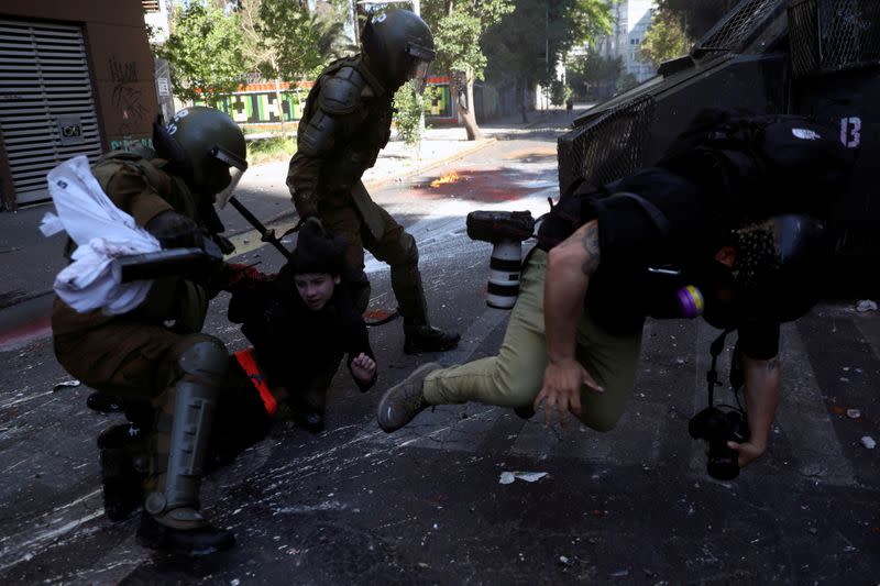 Protest against Chile's government during the one-year anniversary in Santiago of the protests and riots in 2019