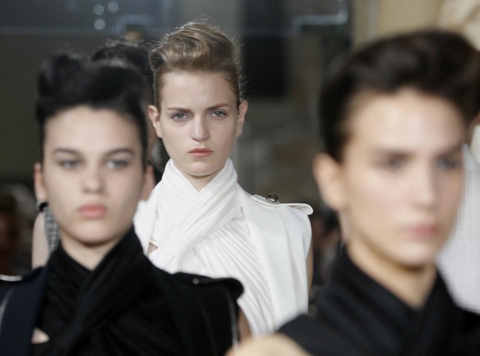 Models wear creations by fashion designer Bouchra Jarrar during her Women's Fall Winter 2013-2014 haute couture fashion collection presented at Antoine Bourdelle Museum in Paris Tuesday, July 2, 2013 in Paris. (AP Photo/Jacques Brinon)