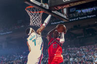 Toronto Raptors' Isaac Bonga (17) shoots against Oklahoma City Thunder's Darius Bazley during the first half of an NBA basketball game Wednesday, Dec. 8, 2021, in Toronto. (Chris Young/The Canadian Press via AP)