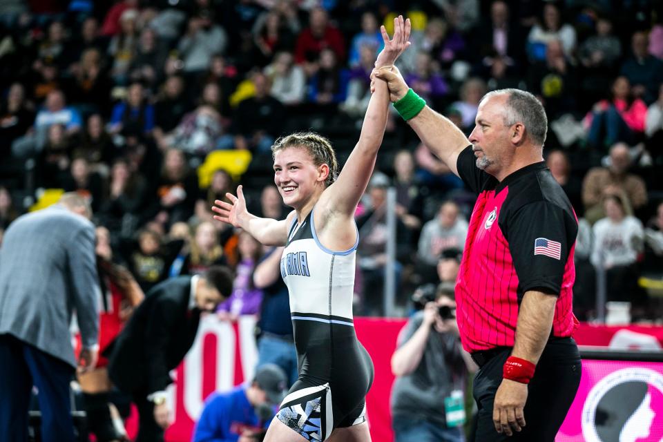 South Tama's Maeley Elsbury celebrates after her match at 135 pounds in the finals during the IGHSAU state girls wrestling tournament, Friday, Feb. 3, 2023, at the Xtream Arena in Coralville, Iowa.