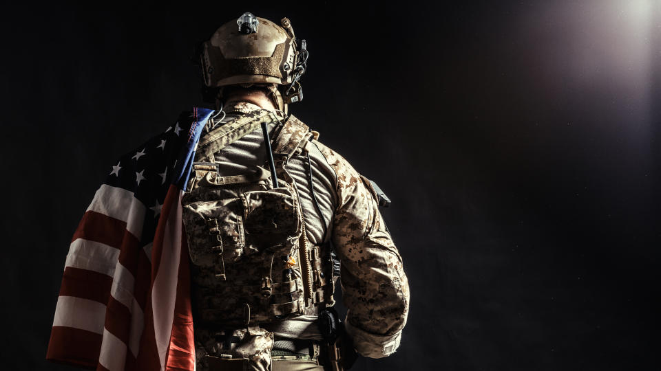 soldier holding flag