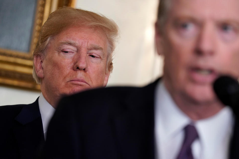 Trump listens to remarks by U.S. Trade Representative Robert Lighthizer at the White House on March 22. (Photo: Jonathan Ernst / Reuters)