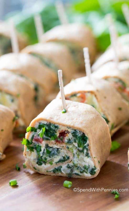 <p>Spend With Pennies</p><p>The familiar flavors from the warm dip, but in a new, cold way.</p><p><strong>Get the recipe: <a href="https://www.spendwithpennies.com/spinach-artichoke-pinwheels/" rel="nofollow noopener" target="_blank" data-ylk="slk:Spinach Artichoke Pinwheels;elm:context_link;itc:0;sec:content-canvas" class="link rapid-noclick-resp">Spinach Artichoke Pinwheels</a></strong></p>
