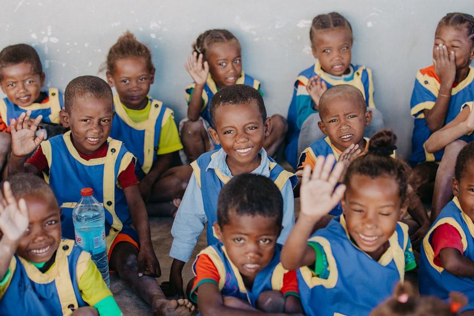 a group of children posing for a photo