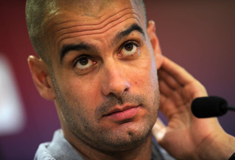 Then Barcelona coach Pep Guardiola gives a press conference at the "Sports Center FC Barcelona Joan Gamper" near Barcelona on August 13, 2011. Guardiola will take over as Bayern Munich head coach for the 2013/14 season, the Bundesliga giants confirmed Wednesday, with the Spaniard offered a contract until 2016