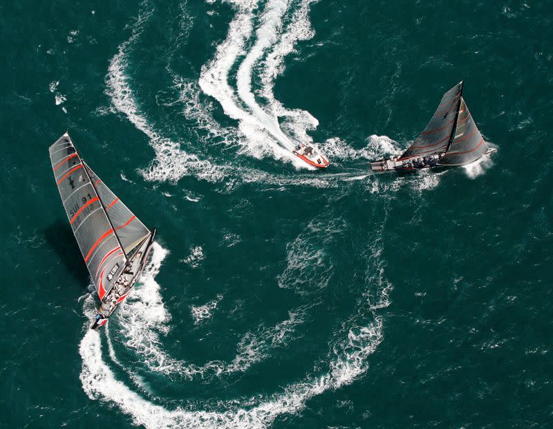 FILE PHOTO: America's Cup defender Alinghi practises ahead of the 32nd America's Cup race against Emirates Team New Zealand in Valencia.