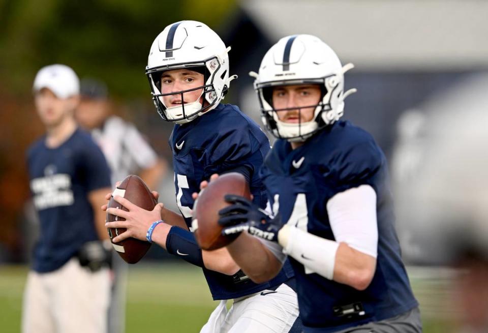 Penn State quarterbacks Drew Allar and Sean Clifford prep to make passes during a drill at practice on Wednesday, Nov. 2, 2022. Abby Drey/adrey@centredaily.com