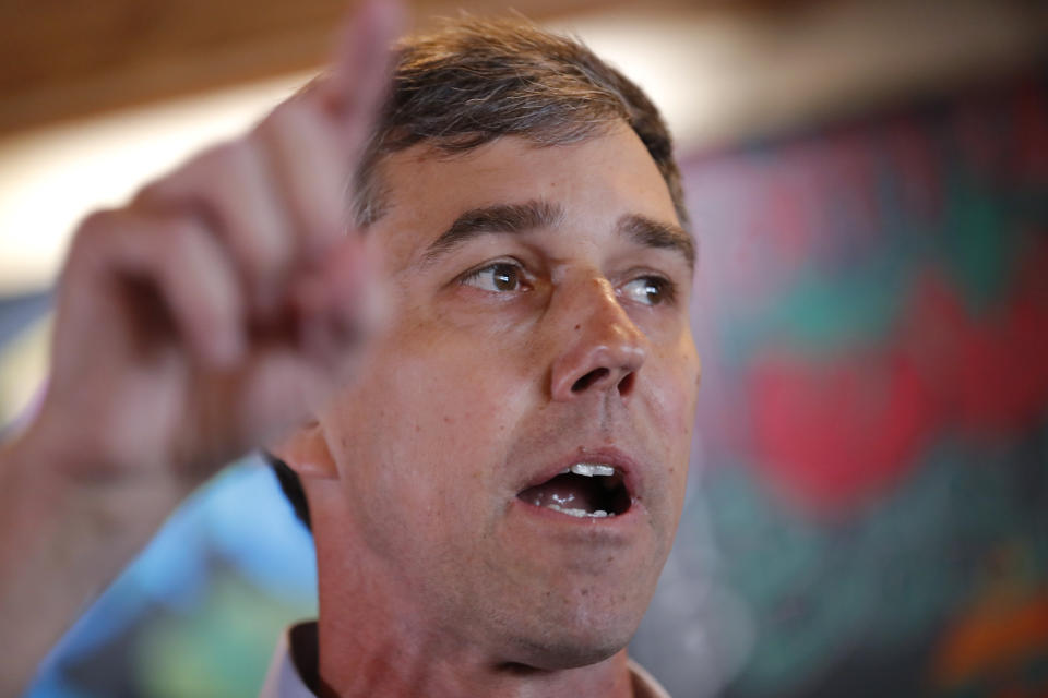 Former Texas congressman Beto O'Rourke speaks to local residents during a stop at the Central Park Coffee Company, Friday, March 15, 2019, in Mount Pleasant, Iowa. O'Rourke announced Thursday that he'll seek the 2020 Democratic presidential nomination. (AP Photo/Charlie Neibergall)