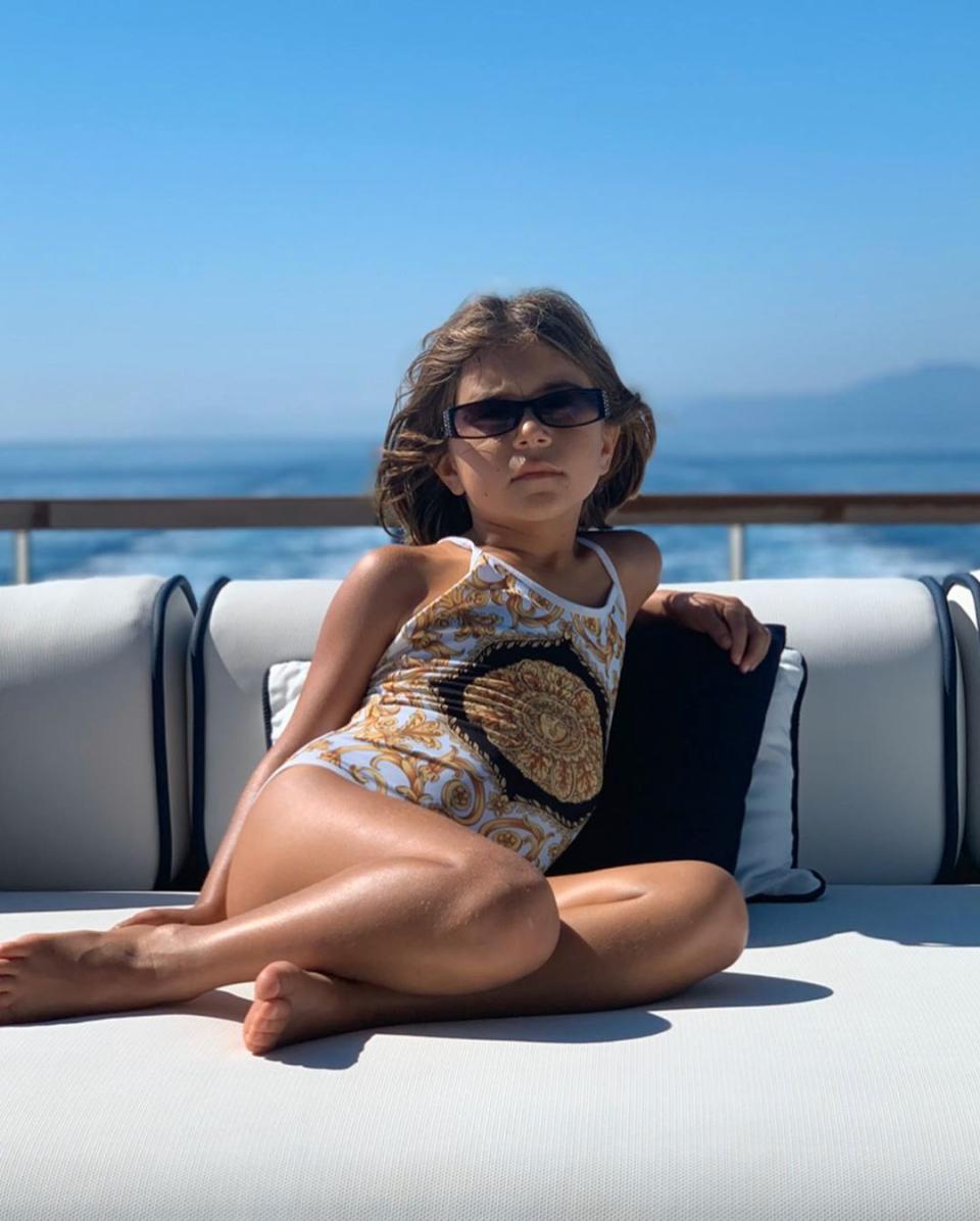 Penelope Disick in a Versace swimsuit