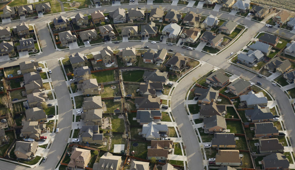 FILE - This April 13, 2019, file photo, shows homes in suburban Salt Lake City. Two studies released Wednesday, June 16, 2021, found that the nation's housing availability and affordability crisis is expected to worsen significantly following the pandemic, likely widening the housing gap between Black, Latino and white households, as well as putting homeownership out of the reach of lower class Americans. (AP Photo/Rick Bowmer, File)