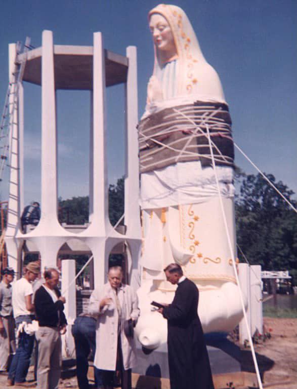 Crews work to install the Our Lady Fatima statue in Russells Point in 1964.