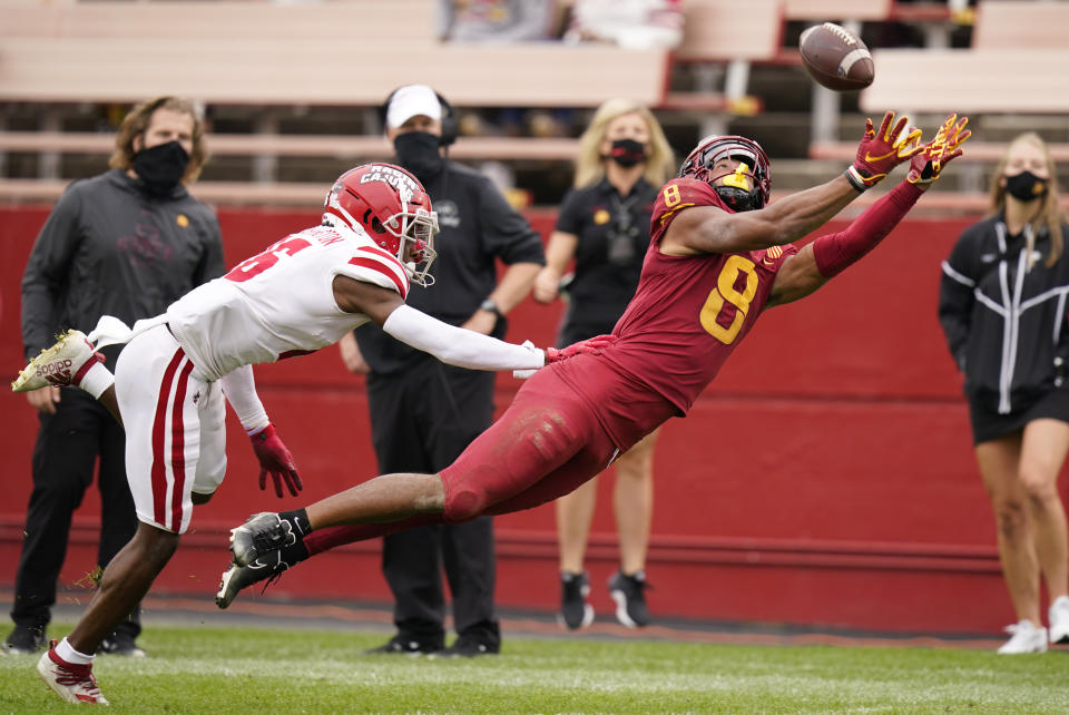Iowa State wide receiver Xavier Hutchinson (8) makes a diving attempt to catch the ball ahead of Louisiana-Lafayette cornerback Asjlin Washington, left, during the second half of an NCAA college football game, Saturday, Sept. 12, 2020, in Ames, Iowa. The pass fell incomplete. Louisiana-Lafayette won 31-14. (AP Photo/Charlie Neibergall)