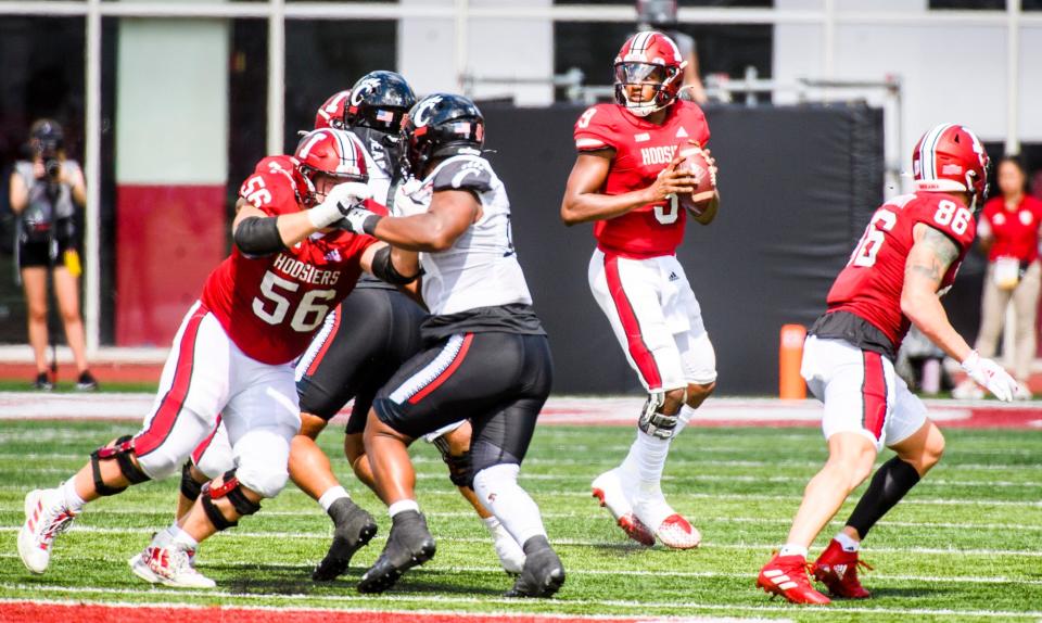 Indiana's Michael Penix (9) looks downfield during the first half of the Indiana versus Cincinnati football game at Memorial Stadium on Saturday, September 18, 2021.