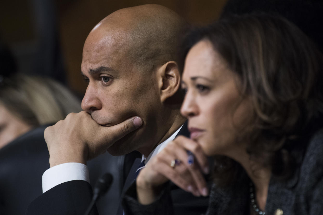 <span class="s1">Cory Booker and fellow Democrat Kamala Harris of California listen to Christine Blasey Ford’s testimony before the Senate Judiciary Committee. (Photo: Tom Williams/CQ Roll Call/Pool/Getty Images)</span>