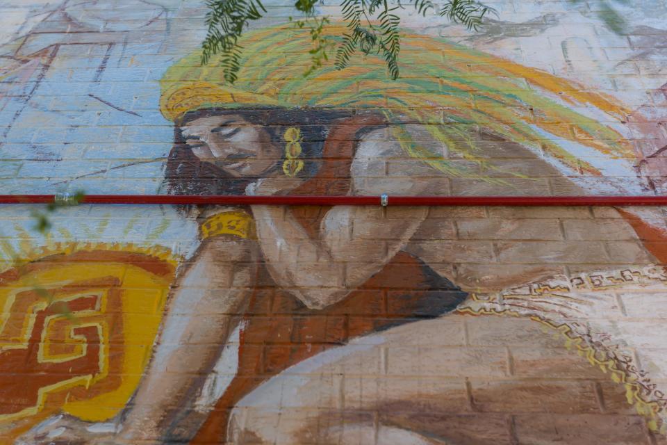 "Iztaccihuatl and Popocatepetl" was painted by Felipe Adame and Varrio Quinta Street (VQS) members in 1991. The mural is located at 615 S. Campbell St. on the exterior east wall of the El Paso Housing Authority Apartment Complex in Segundo Barrio in El Paso, Texas.