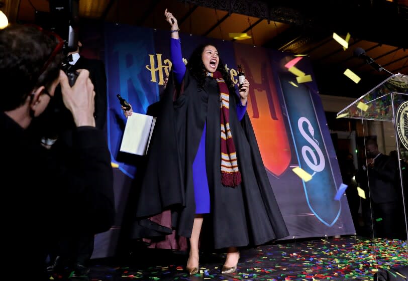 SAN FRANCISCO, CA - FEBRUARY 24: London Breed, right, mayor of San Francisco, shown with Colin Calander, second from left, producer of the show, addresses the crowd at the Curran Theater in Union Square for the "re-opening" of Harry Potter and the Cursed Child in downtown on Thursday, Feb. 24, 2022 in San Francisco, CA. Mayor Breed is the 45th mayor of the City and County of San Francisco. She was supervisor for District 5 and was president of the Board of Supervisors from 2015 to 2018. (Gary Coronado / Los Angeles Times)