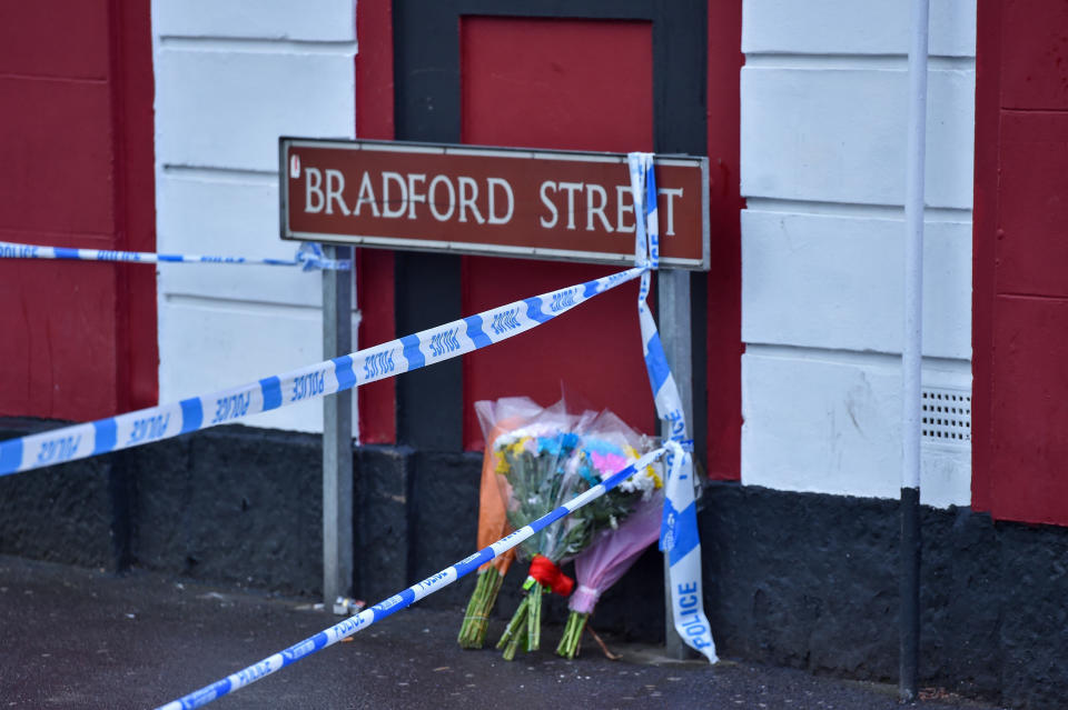 Floral tributes were left at the scene following the stabbing. (SWNS)