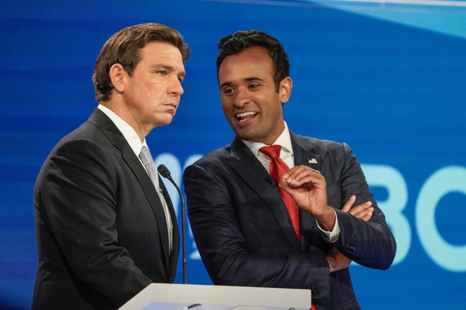 Gov. Ron DeSantis and businessperson Vivek Ramaswamy after the conclusion of the Republican National Committee presidential primary debate hosted by NBC News at Adrienne Arsht Center for the Performing Arts of Miami-Dade County on Nov. 8.