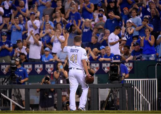 Danny Duffy acknowledges the crowd after pitching a gem in Friday's win against Texas. (Getty Images)
