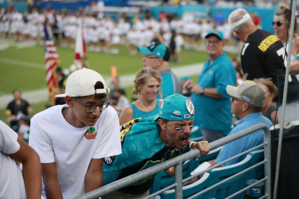 A Jacksonville Jaguars fan yells before a NFL preseason game against the Pittsburgh Steelers Saturday, Aug. 20, 2022 at TIAA Bank Field in Jacksonville. [Corey Perrine/Florida Times-Union]