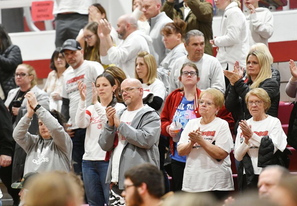 Freedom fans give the Bulldogs a standing ovation after a season-ending loss to Bishop McCort during Friday night's PIAA Class 2A playoff game at Freedom High School.