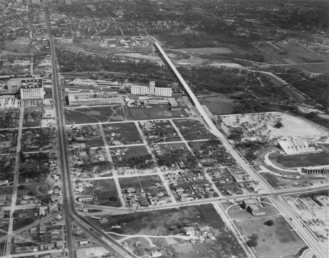 March 22, 1939: In this aerial view looking east toward downtown, the Camp Bowie/West Seventh/University intersection is in the right foreground. Montgomery Ward is in the distance down West Seventh, and Farrington Field is on the far right. Clearly visible is the Lancaster Street bridge, which hadn’t yet been connected to Summit Avenue in the upper center.