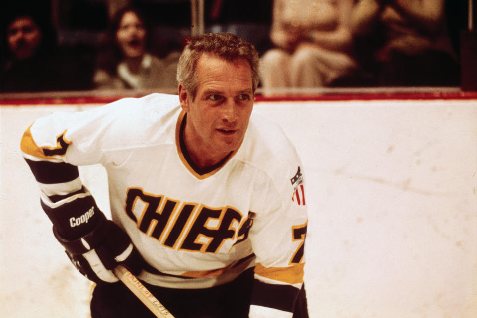 This undated photo provided Courtesy of Universal Pictures shows actor Paul Newman in a scene from the movie "Slap Shot," voted No. 5 in The Associated Press’ Top 25 favorite sports movies poll. (Courtesy of Universal Pictures via AP)