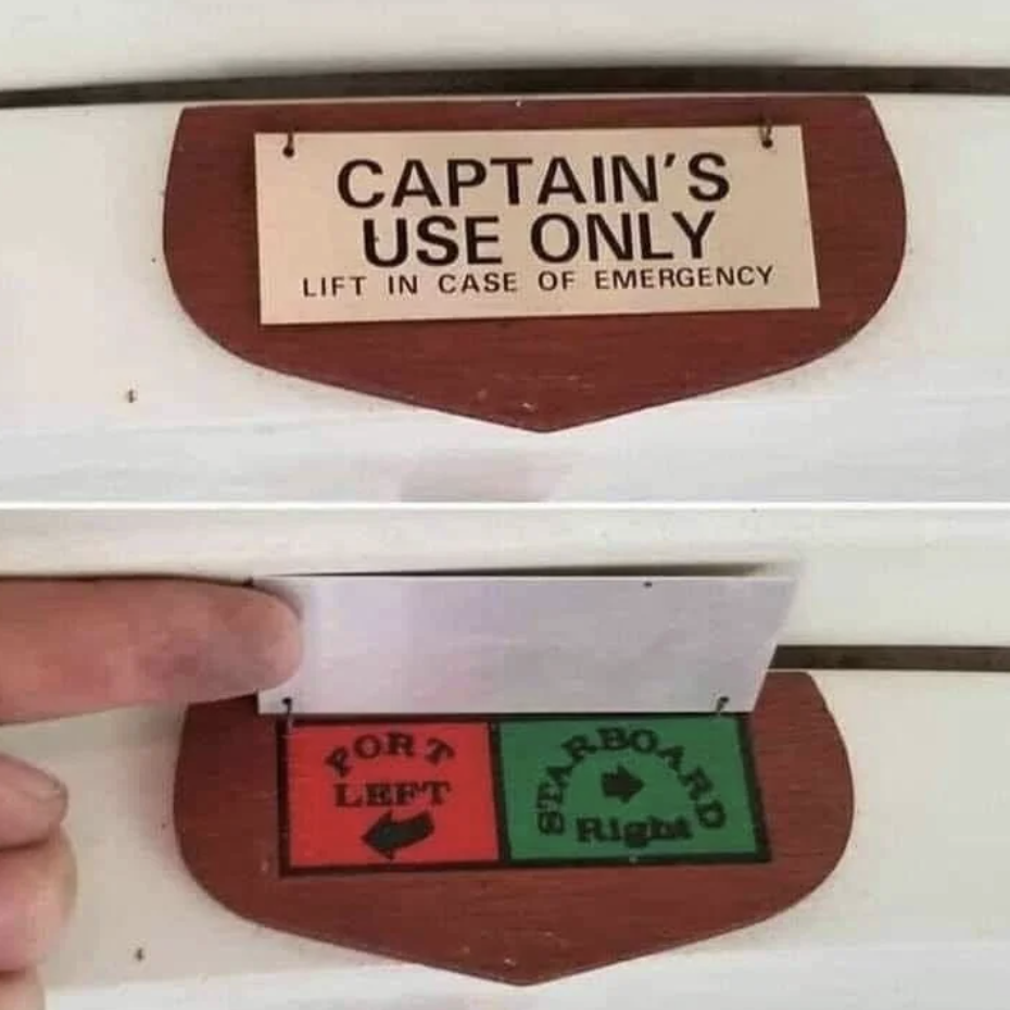 Sign reading 'CAPTAIN'S USE ONLY' lifts to reveal navigation aids underneath