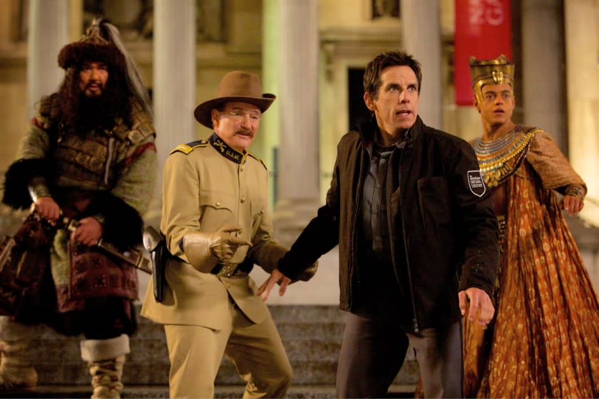 Atilla the Hun (Patrick Gallagher), Teddy Roosevelt (Robin Williams), Larry Daley (Ben Stiller) and Ahkmenrah (Rami Malek) in a scene from "Night at the Museum: Secret of the Tomb."