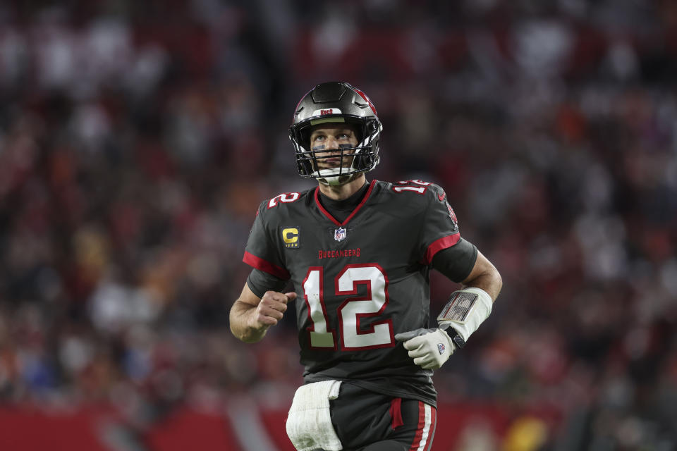 Tampa Bay Buccaneers quarterback Tom Brady (12) leaves the field after an NFL football game between the Tampa Bay Buccaneers and the Cincinnati Bengals, Sunday, Dec. 18, 2022, in Tampa, Fla. The Cincinnati Bengals won 34-23. (AP Photo/Mark LoMoglio)